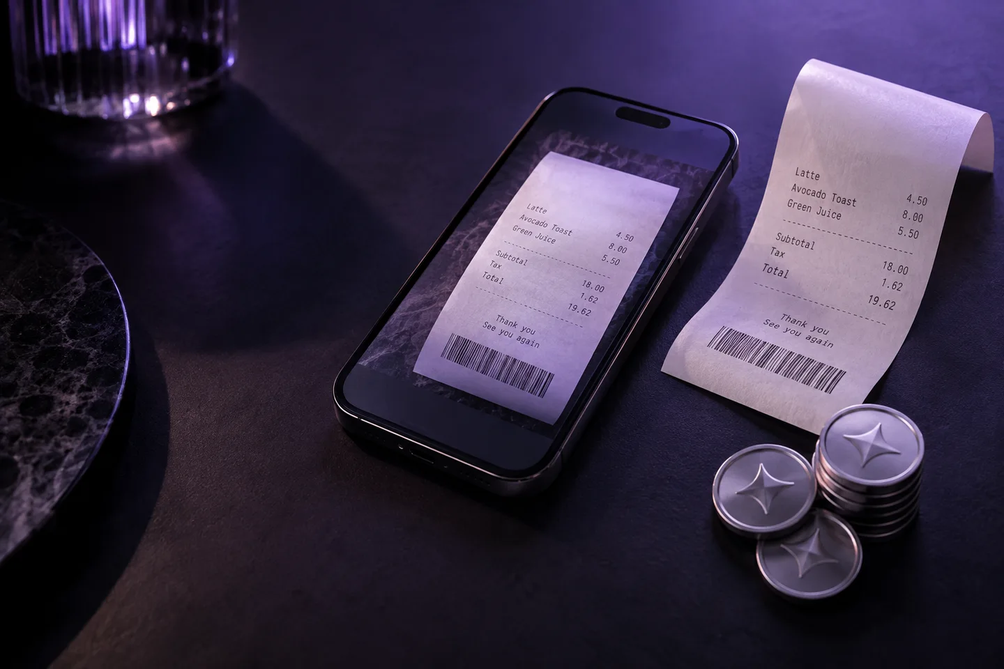A scanned receipt on a phone beside a paper receipt and reward tokens.